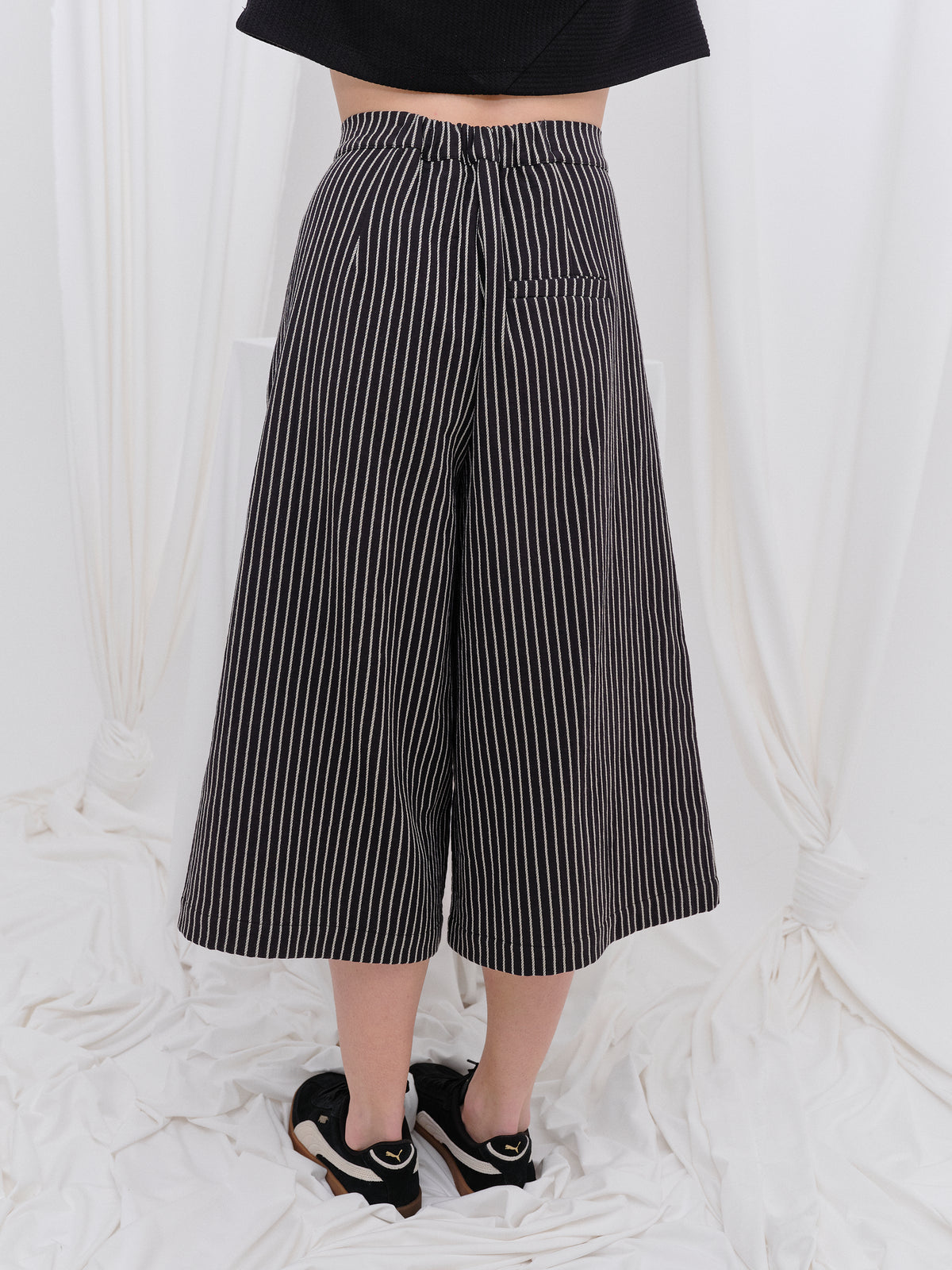 PANTALÓN CAPARINA NEGRO RAYAS